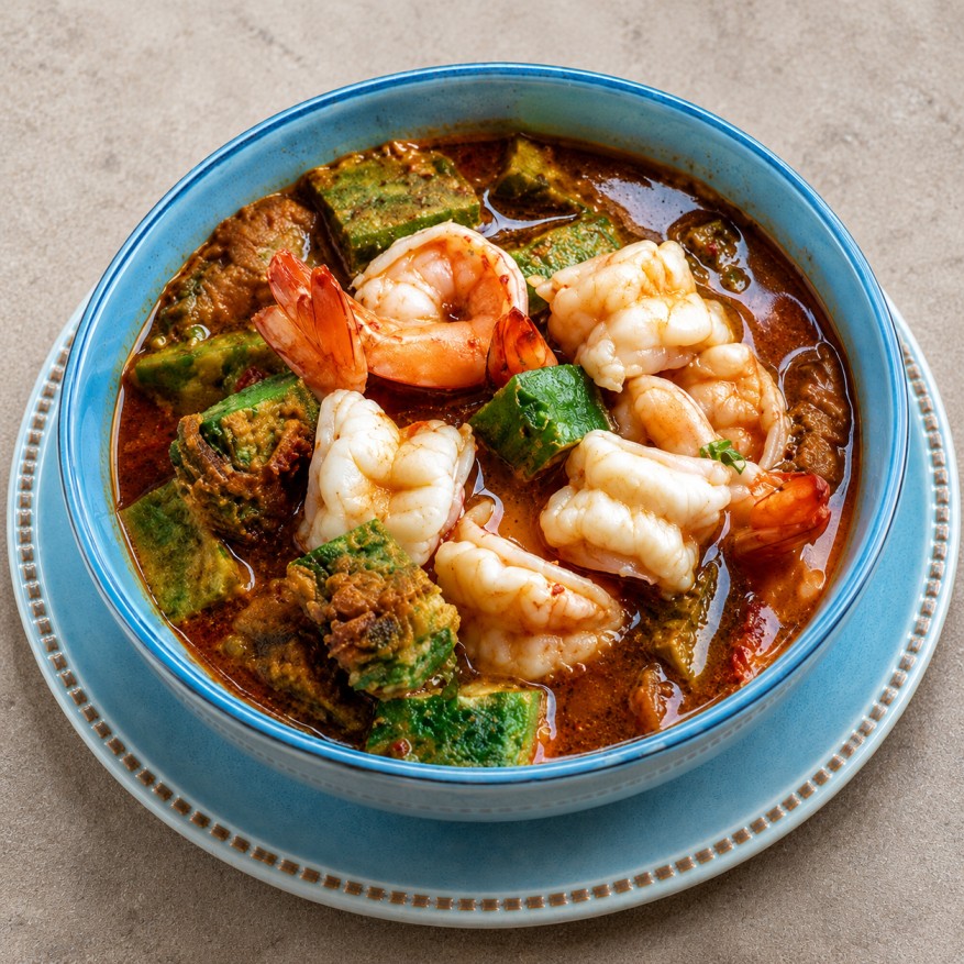 Sour curry with acacia leaves and shrimp